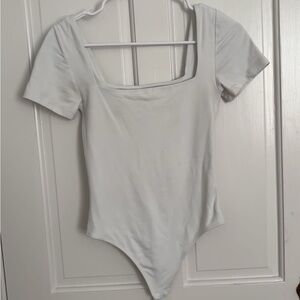 WHITE ARITZIA BODY SUIT